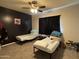 Two twin beds in a spacious bedroom with dark accent wall at 12649 W Cabrillo Dr, Arizona City, AZ 85123