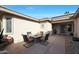 Relaxing courtyard with seating area and fire pit at 15938 W Summerwalk Dr, Surprise, AZ 85374