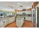 Modern kitchen with granite countertops and stainless steel appliances at 15938 W Summerwalk Dr, Surprise, AZ 85374