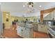 Modern kitchen featuring granite countertops and stainless steel appliances at 15938 W Summerwalk Dr, Surprise, AZ 85374