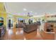 Spacious living room with hardwood floors and access to backyard at 15938 W Summerwalk Dr, Surprise, AZ 85374