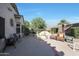 Relaxing patio with fire pit and comfortable seating at 15938 W Summerwalk Dr, Surprise, AZ 85374