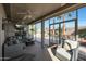 Enjoy the view from this screened patio, complete with seating and TV at 15938 W Summerwalk Dr, Surprise, AZ 85374