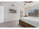 Main bedroom with ensuite bathroom and large window at 16268 S 12Th Pl, Phoenix, AZ 85048