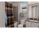 Clean bathroom with a tub, shower, toilet and vanity at 16925 W Virginia Ave, Goodyear, AZ 85395