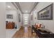 Bright entryway with hardwood floors and built-in shelving at 16925 W Virginia Ave, Goodyear, AZ 85395