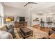 Open living room with a view of the kitchen and hardwood floors at 16925 W Virginia Ave, Goodyear, AZ 85395