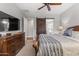 Large main bedroom with sliding barn door to bathroom at 16925 W Virginia Ave, Goodyear, AZ 85395