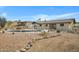 Backyard oasis with kidney-shaped pool and desert landscaping at 17112 E La Pasada Dr, Fountain Hills, AZ 85268