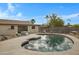 Inviting backyard with sparkling pool and rock accents at 17112 E La Pasada Dr, Fountain Hills, AZ 85268
