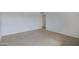 Bright bedroom with carpet flooring and door at 17112 E La Pasada Dr, Fountain Hills, AZ 85268