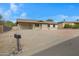 Front view of single story home with driveway at 17112 E La Pasada Dr, Fountain Hills, AZ 85268