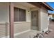 Front door entry with screen door and brick facade at 17112 E La Pasada Dr, Fountain Hills, AZ 85268