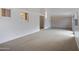 Bright Gathering room with multiple sliding doors and built in shelving at 17112 E La Pasada Dr, Fountain Hills, AZ 85268
