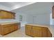 Open kitchen featuring wood cabinets and an island at 17112 E La Pasada Dr, Fountain Hills, AZ 85268