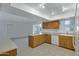 Kitchen with wood cabinets and tile flooring at 17112 E La Pasada Dr, Fountain Hills, AZ 85268