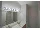 Bathroom with double sinks, vanity, and a mirrored medicine cabinet at 19816 N 34Th Pl, Phoenix, AZ 85050