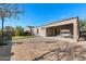 Wonderful backyard oasis with a covered patio and putting green at 203 E Crescent Pl, Chandler, AZ 85249