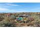 Aerial view of community with pool and desert landscape at 20801 N 90Th Pl # 205, Scottsdale, AZ 85255