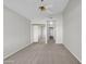 Bright bedroom with mirrored closet doors and ceiling fan at 2350 E Evans Dr, Phoenix, AZ 85022