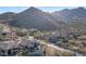 Aerial view of luxury homes nestled in mountain community at 24350 N Whispering Ridge Way # 50, Scottsdale, AZ 85255