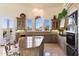 Spacious kitchen boasts granite island, custom cabinetry, and scenic views at 26485 N 108Th Way, Scottsdale, AZ 85255