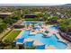 Aerial view of a large community pool with surrounding amenities at 30213 N 124Th Ln, Peoria, AZ 85383