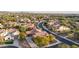 Aerial view of a residential neighborhood with houses and landscaping at 30213 N 124Th Ln, Peoria, AZ 85383