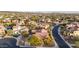 Aerial view of a residential neighborhood with houses and landscaping at 30213 N 124Th Ln, Peoria, AZ 85383