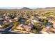 Aerial view showcasing the house, pool, and surrounding neighborhood at 30213 N 124Th Ln, Peoria, AZ 85383