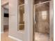 Bathroom with walk-in shower and glass enclosure at 30213 N 124Th Ln, Peoria, AZ 85383