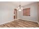 Bright dining area with hardwood floors and chandelier at 30213 N 124Th Ln, Peoria, AZ 85383