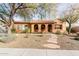 Single story home with attractive landscaping and stone pathway at 30213 N 124Th Ln, Peoria, AZ 85383