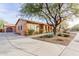Single-story home with attractive landscaping and stone pathway at 30213 N 124Th Ln, Peoria, AZ 85383