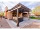 Hot tub under a pergola in a backyard setting at 30213 N 124Th Ln, Peoria, AZ 85383