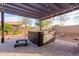 Hot tub with pergola and surrounding landscaping at 30213 N 124Th Ln, Peoria, AZ 85383
