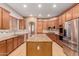 Modern kitchen featuring stainless steel appliances and granite countertops at 30213 N 124Th Ln, Peoria, AZ 85383