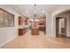 Kitchen features island, wood cabinets and granite countertops at 30213 N 124Th Ln, Peoria, AZ 85383