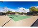 Well-maintained tennis court, ready for a game at 30213 N 124Th Ln, Peoria, AZ 85383