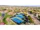 Modern tennis courts with excellent lighting and green space at 30213 N 124Th Ln, Peoria, AZ 85383