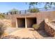 Underpass pathway with stone walls and signage at 30213 N 124Th Ln, Peoria, AZ 85383