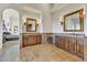 Spa-like bathroom with double vanities and large mirrors at 30409 N 142Nd St, Scottsdale, AZ 85262