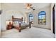 Spacious bedroom with large windows and ornate bed at 30409 N 142Nd St, Scottsdale, AZ 85262