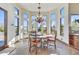 Bright breakfast nook with large windows and chandelier at 30409 N 142Nd St, Scottsdale, AZ 85262