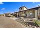 Luxury home with a large driveway and desert landscaping at 30409 N 142Nd St, Scottsdale, AZ 85262