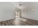 Bedroom with wood-look flooring and sliding glass door at 3041 E Wahalla Ln, Phoenix, AZ 85050