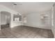 Open dining area with tile flooring and view to kitchen at 3041 E Wahalla Ln, Phoenix, AZ 85050