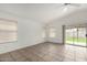Bright Gathering room with tile flooring, sliding glass door to backyard at 3041 E Wahalla Ln, Phoenix, AZ 85050