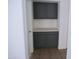 Gray hallway storage with upper and lower cabinets and white counter in a neutral hallway at 3041 E Wahalla Ln, Phoenix, AZ 85050