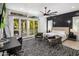 Spacious bedroom with backyard access and modern furniture at 3322 N Valencia Ln, Phoenix, AZ 85018